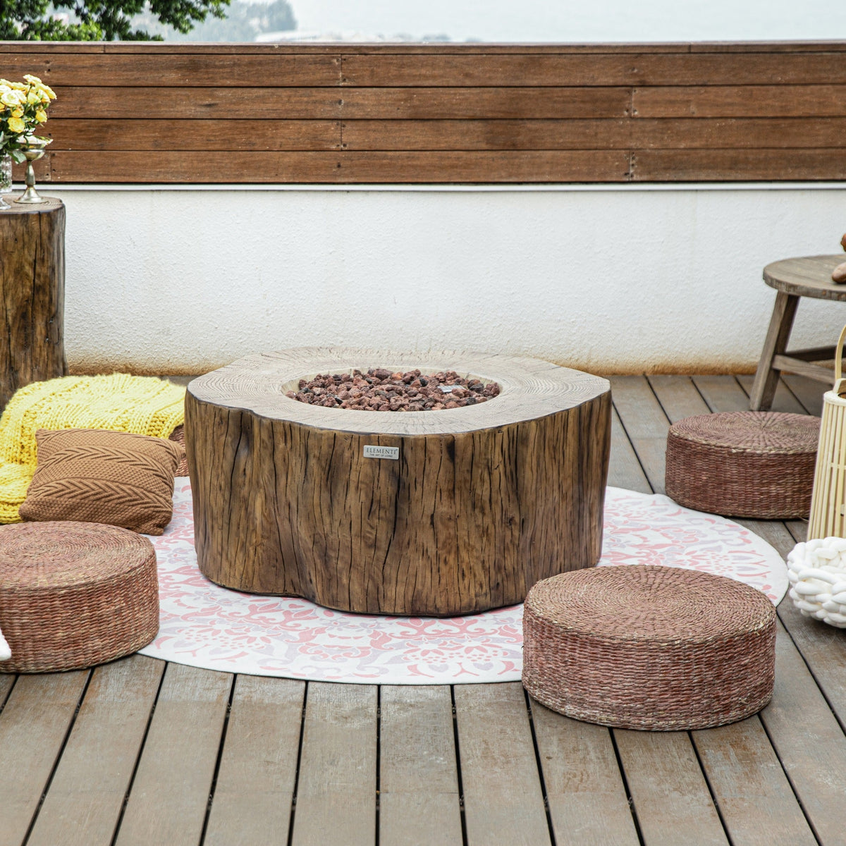 Manchester Redwood fire table in an outdoor lounge; seating and decor not included