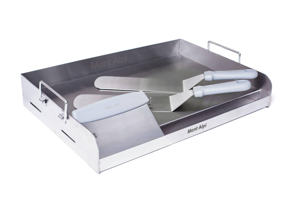 Mont Alpi MASHP stainless steel griddle and tools, angled view
