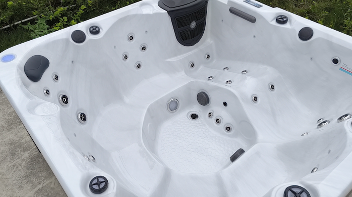 SkyBlue Montana hot tub, wide interior seating and lounge view