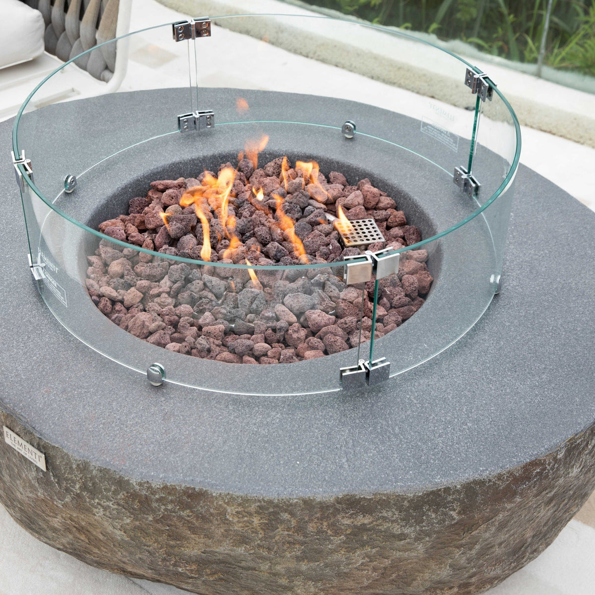 Boulder fire table with optional ONC05-001 windscreen, sold separately