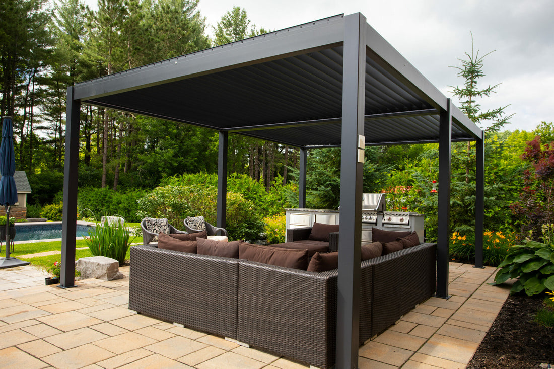 Procam Villa pergola in charcoal over a furnished garden patio