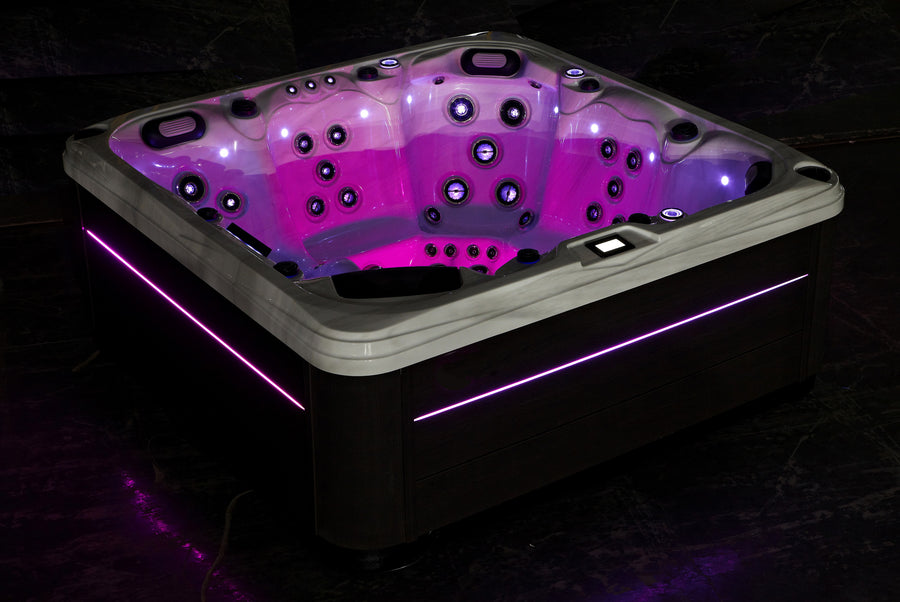 SkyBlue Vegas Lite hot tub with illuminated jets and cabinet lighting